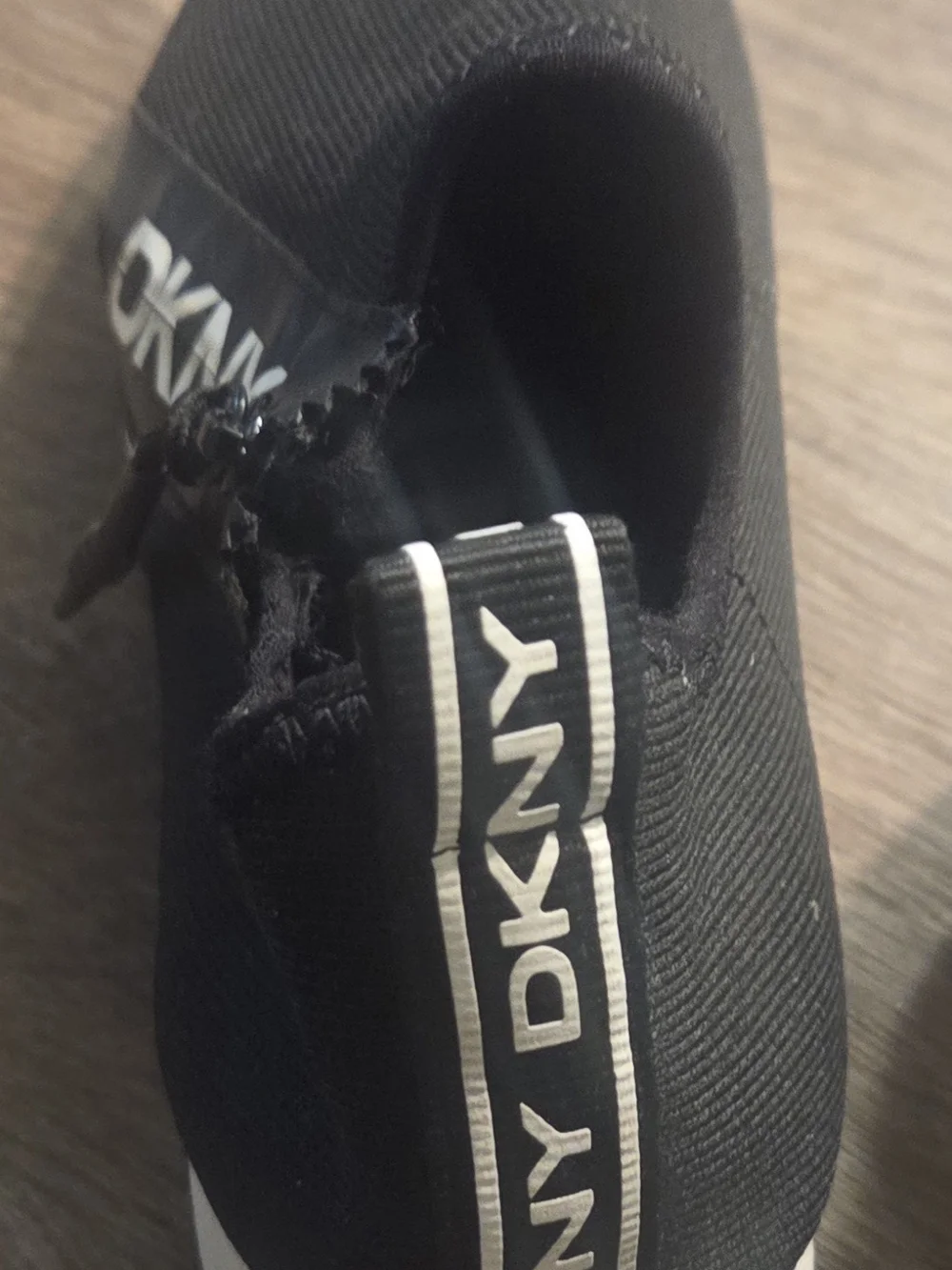 DKNY Men’s Black Slip-On Knit Sneakers